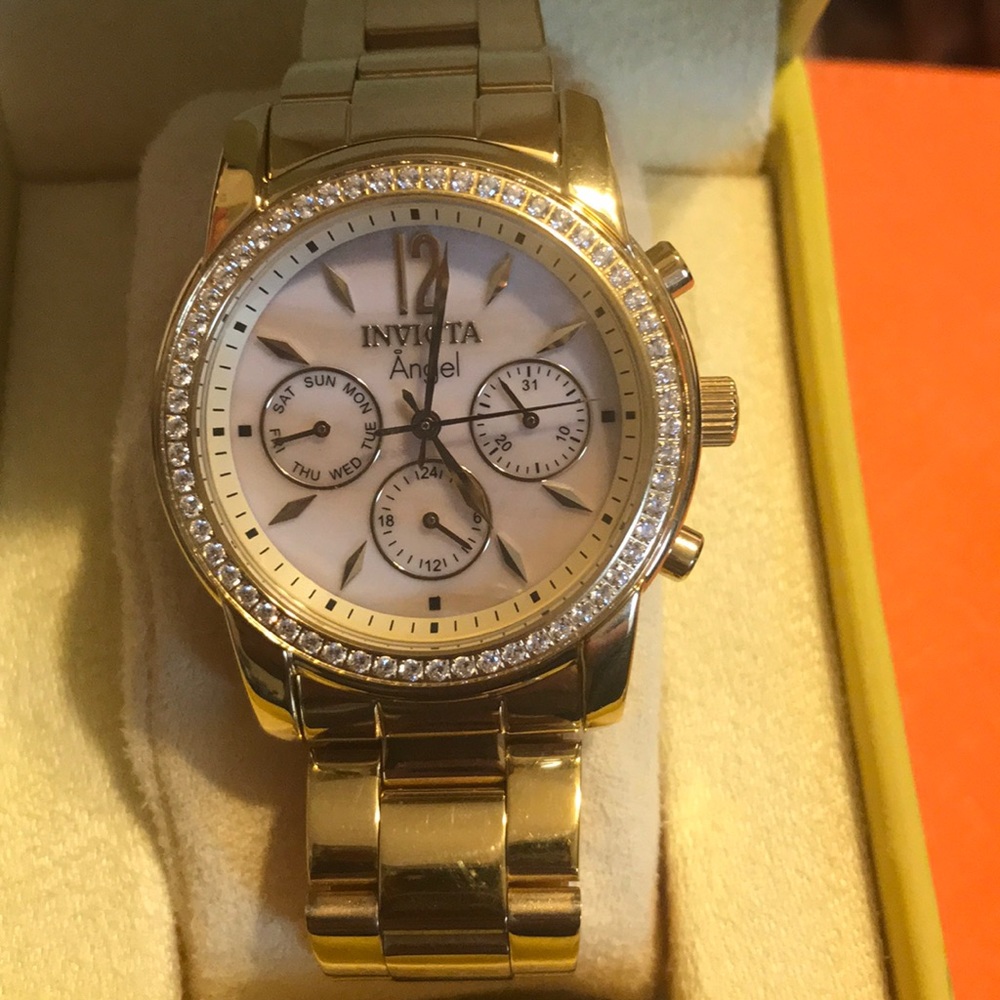 Gold mother of pearl invicta angel watch